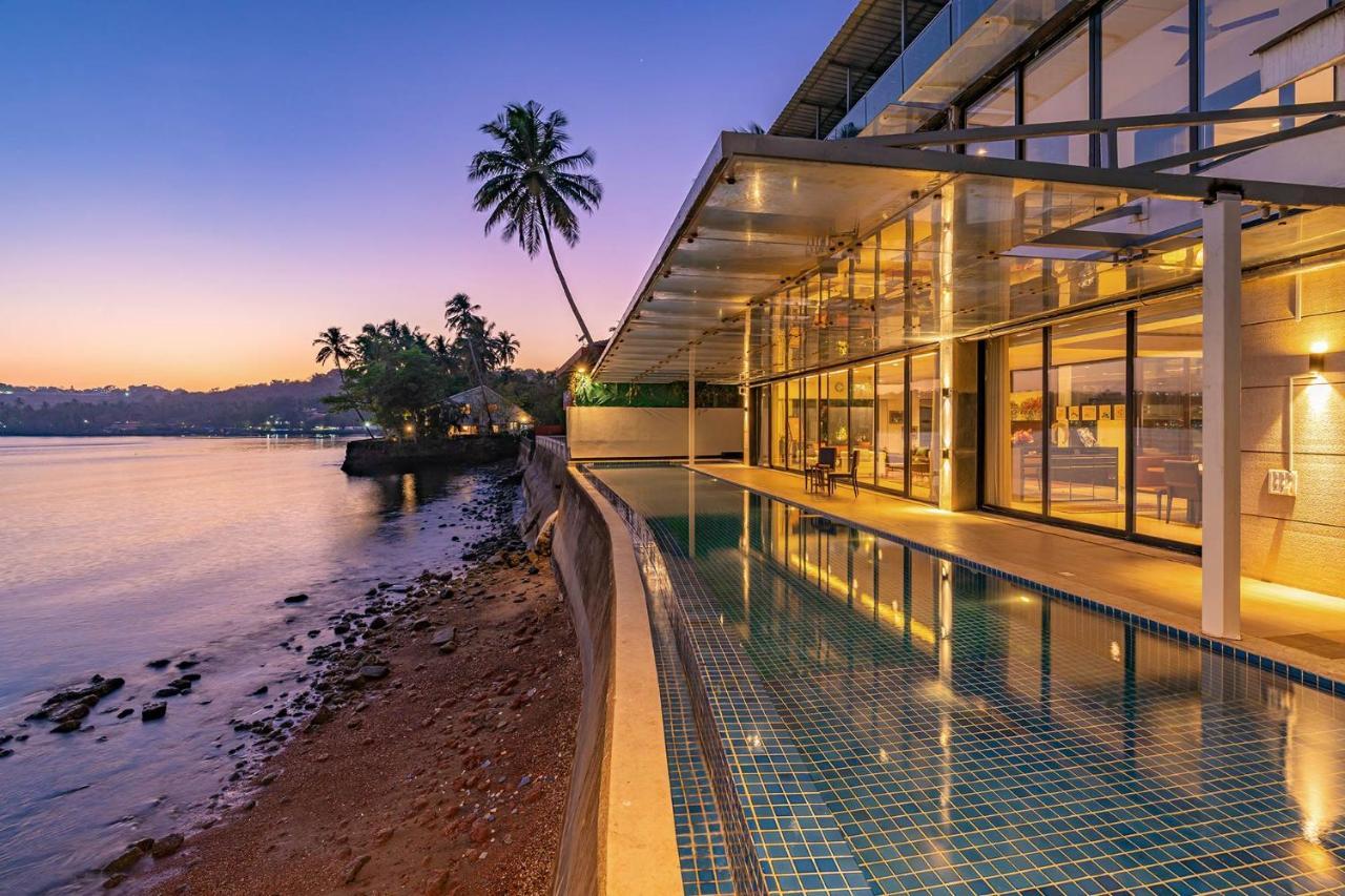 Oceanic Sunsets With River View, Comp Breakfast & Infinity Pool At Stayvista Verem エクステリア 写真